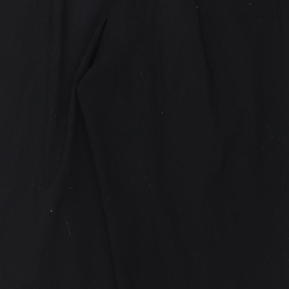Brand and care label for Marks & Spencer women’s black trouser suit suit top, size UK 12, 28-inch leg - side fastening
