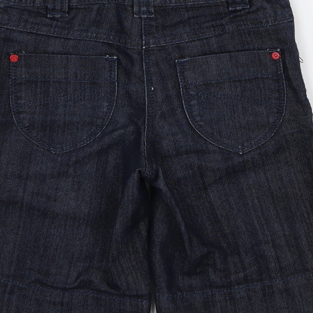 Brand and care label for Next girls’ blue denim flared jeans, size 4, years