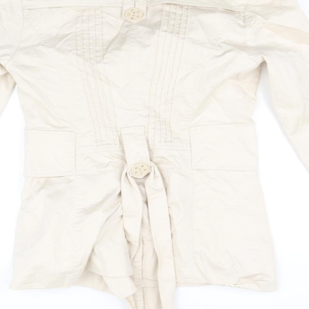 Brand and care label for Villa Collection women’s beige jacket, size M