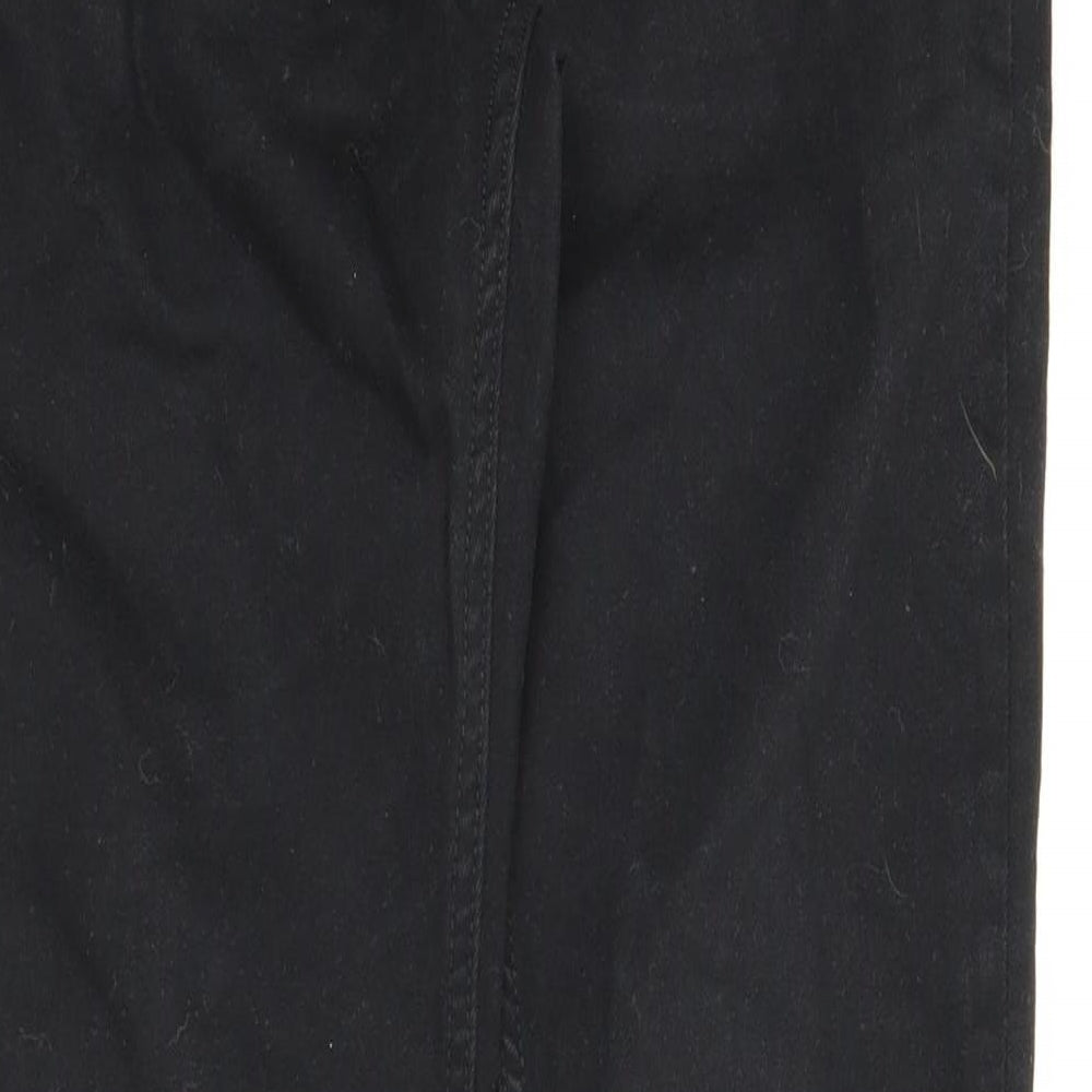 Brand and care label for Next girls’ black denim skinny jeans, size 12, years