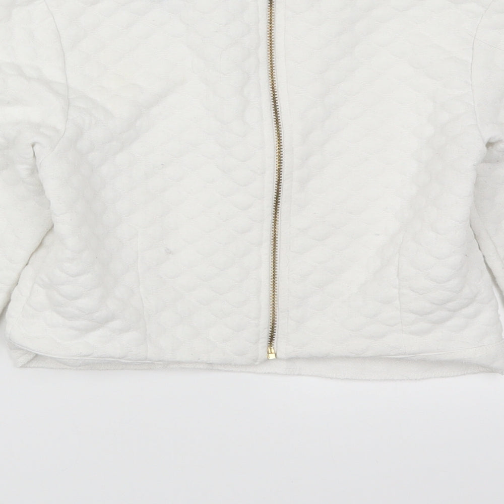 Brand and care label for H&M women’s white pullover sweatshirt, size XS