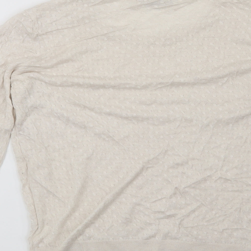 Brand and care label for H&M women’s beige jumper, size M