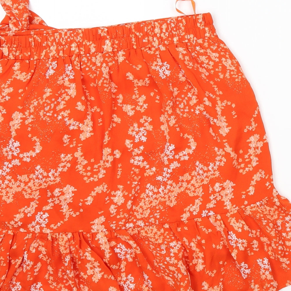 Brand and care label for Soaked women’s orange floral wrap skirt, size S