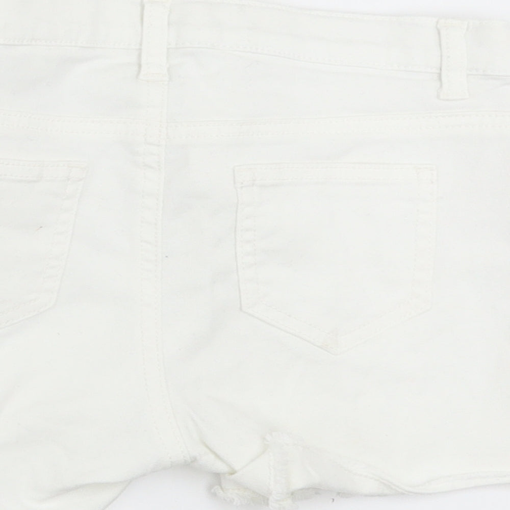 Brand and care label for H&M girls’ white hot pants shorts, size 10, years