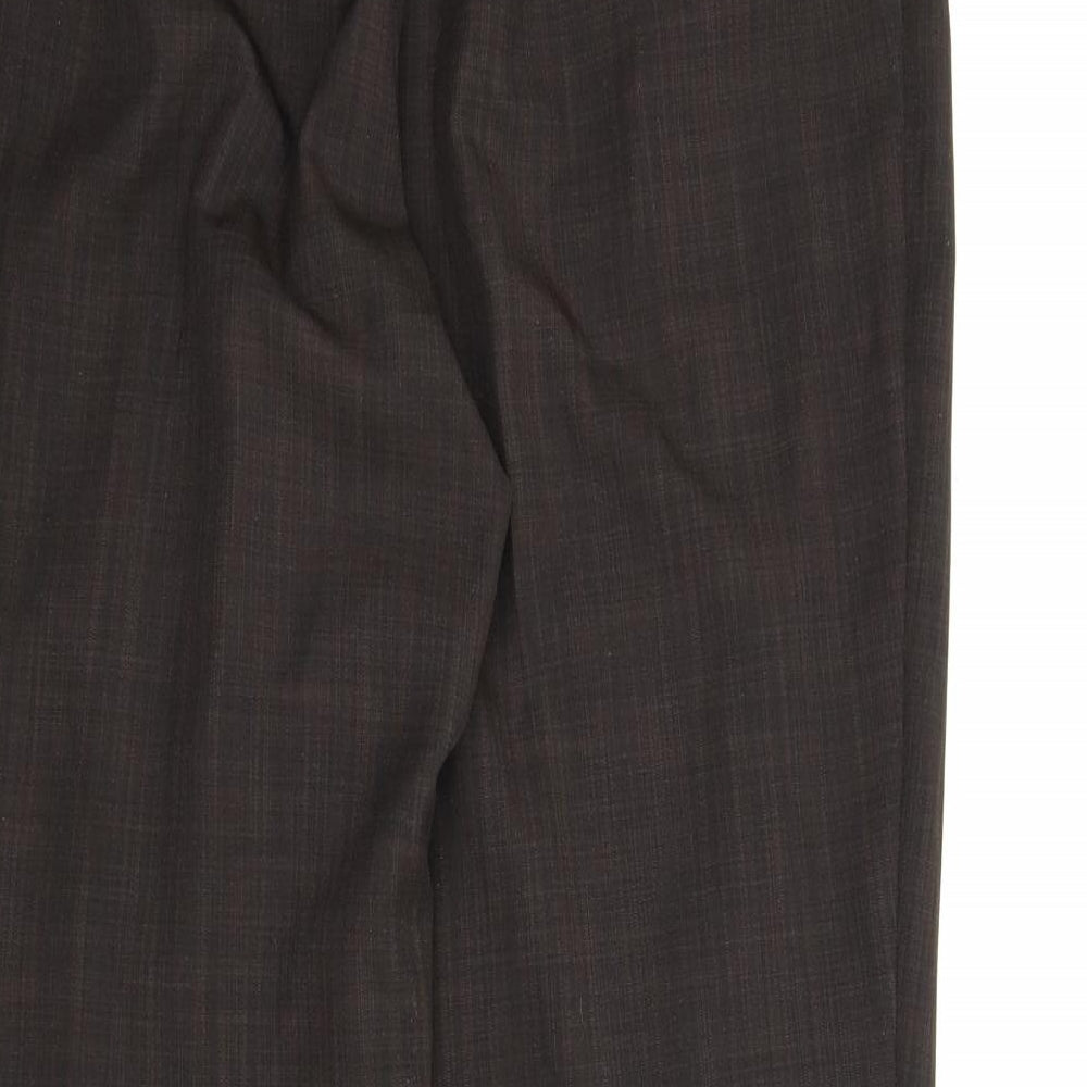 Brand and care label for Marks & Spencer women’s brown carrot trousers, size UK 12, 25-inch leg