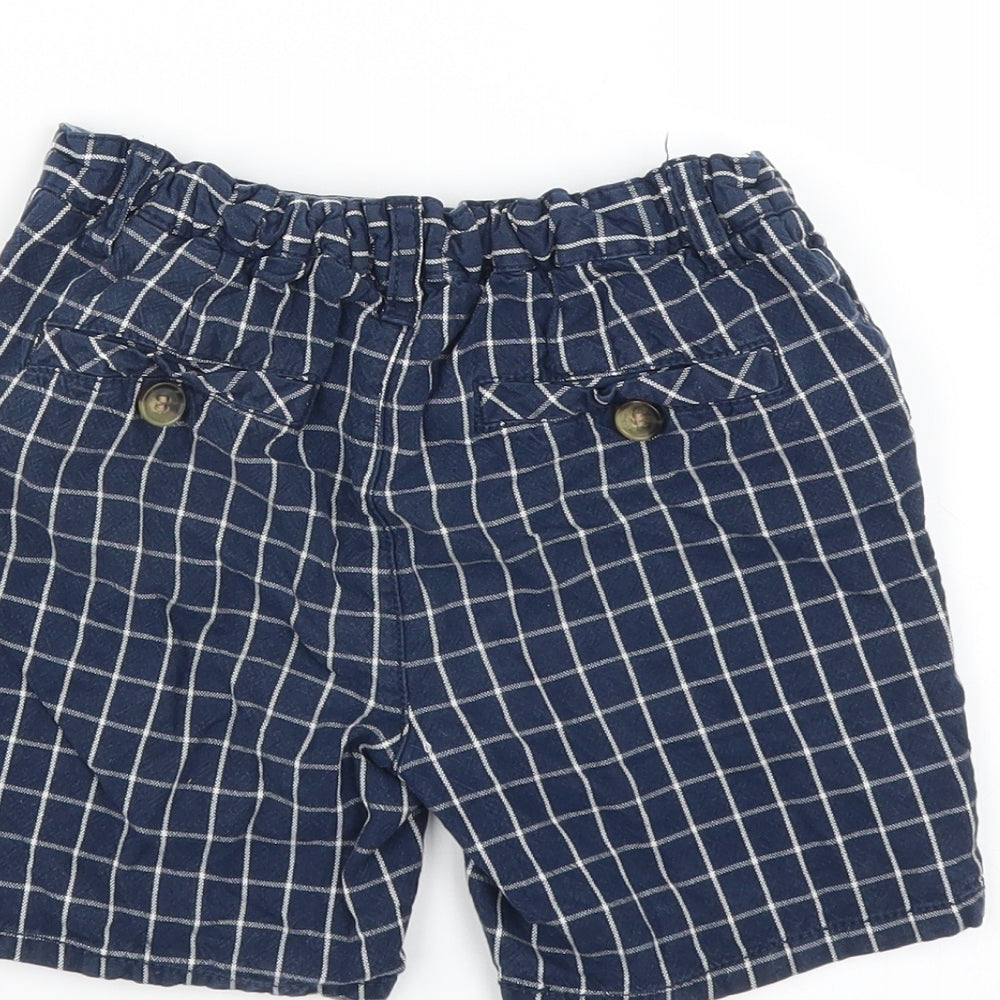Brand and care label for Matalan boys’ blue check bermuda shorts, size 4-5, years