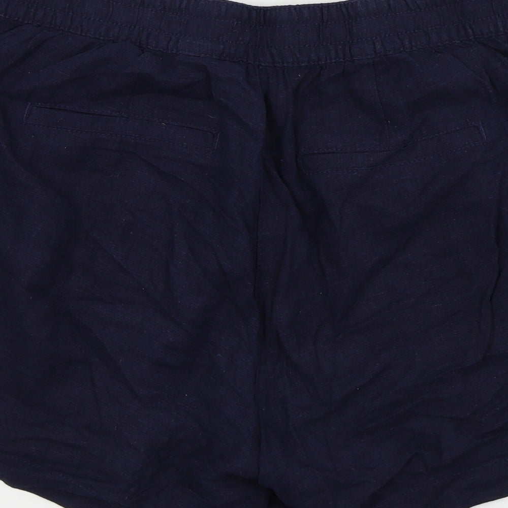 Brand and care label for Next women’s blue hot pants shorts, size UK 14
