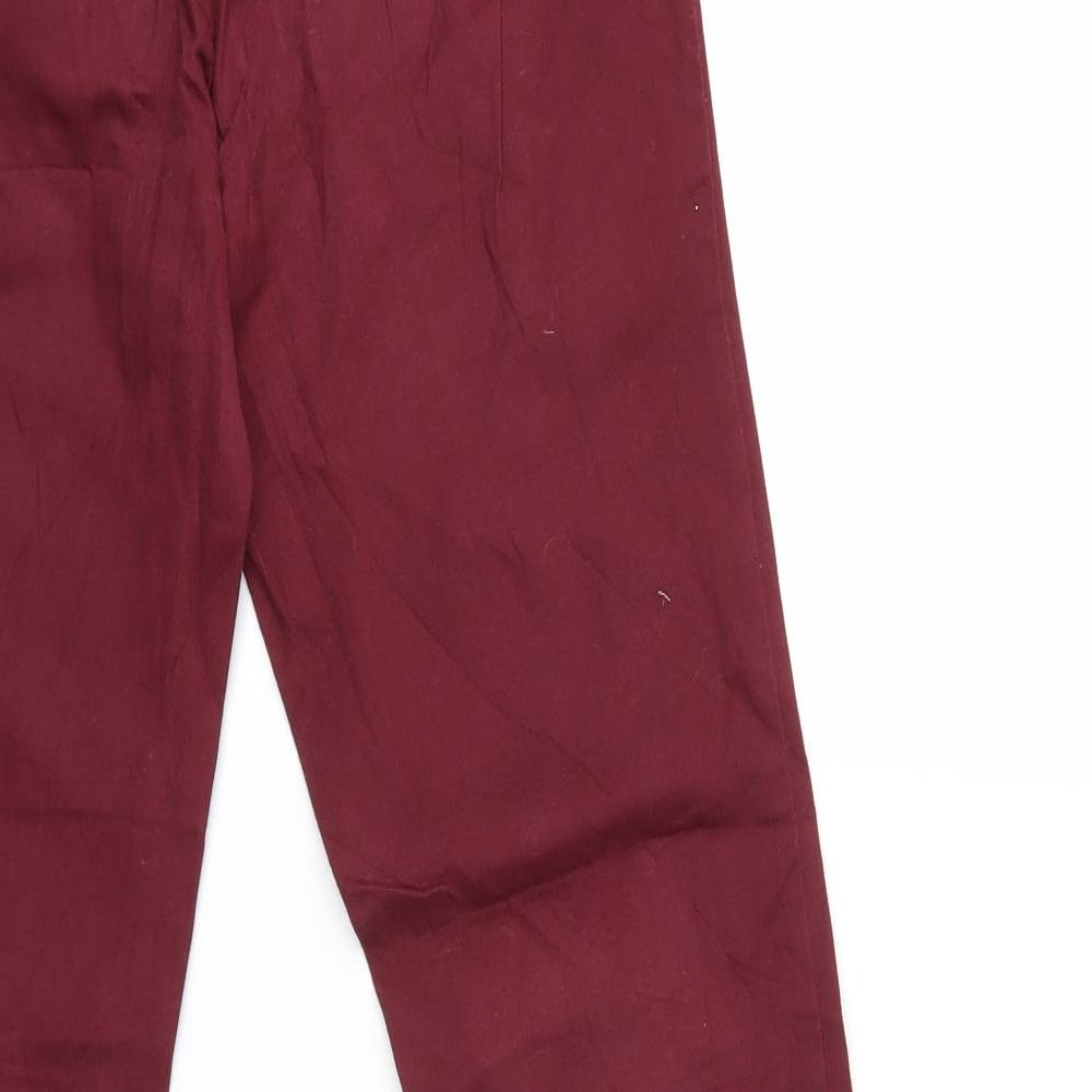 Brand and care label for H&M women’s red denim skinny jeans, size UK 10, 29-inch leg