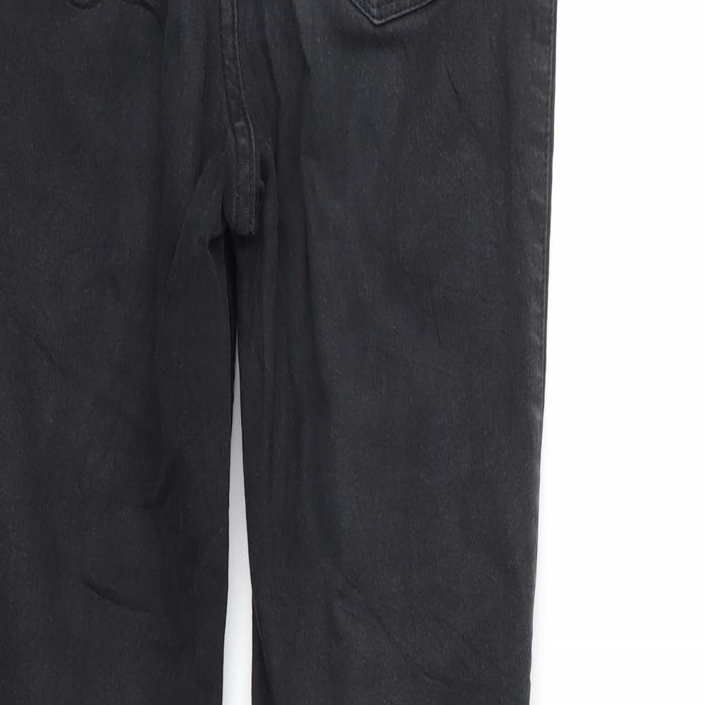 Brand and care label for Sinsay women’s black denim skinny jeans, size S, 28-inch leg