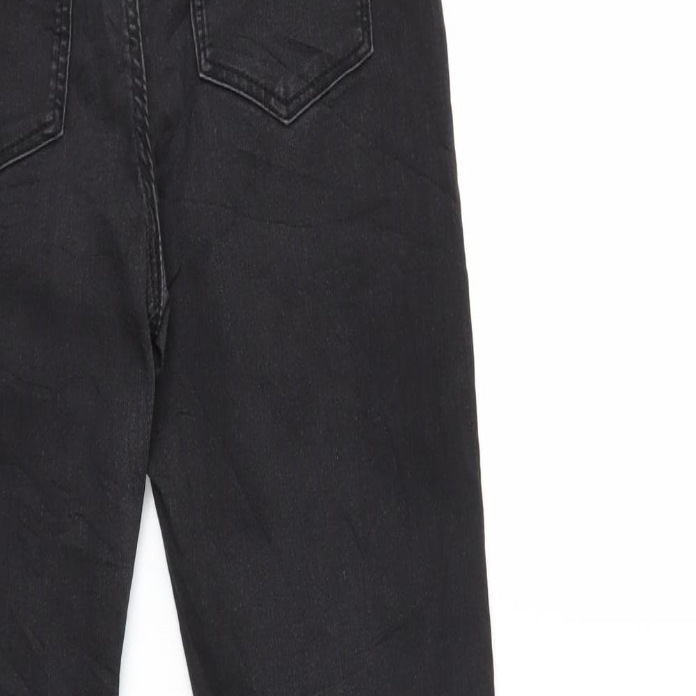 Brand and care label for H&M girls’ black denim skinny jeans, size 12, years
