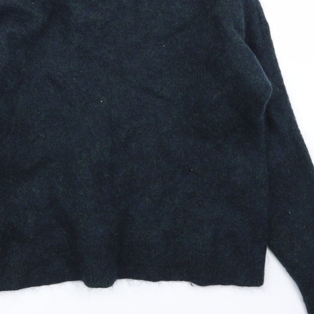 Brand and care label for H&M women’s green jumper, size S