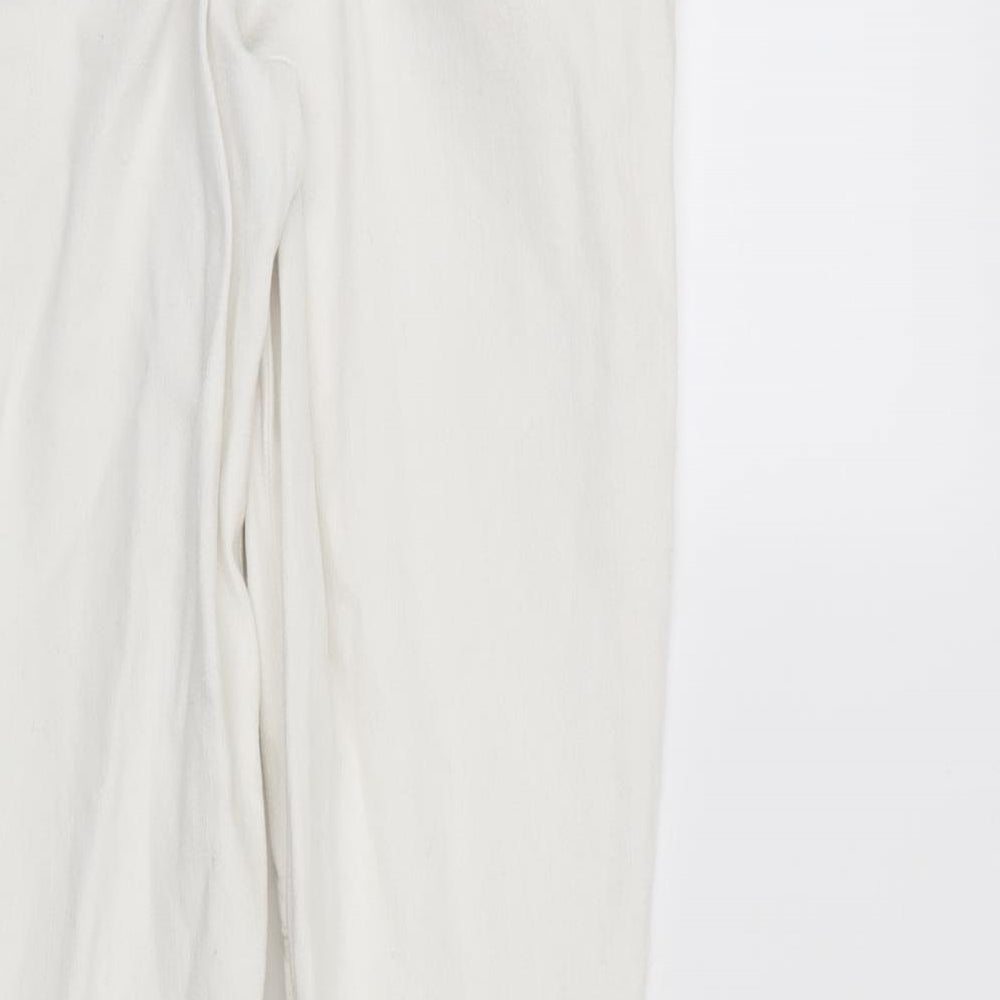 Brand and care label for Topshop women’s white skinny jeans, size UK 8, 25-inch leg