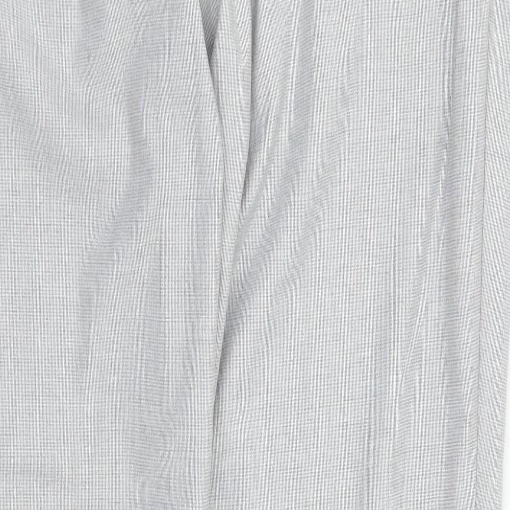 Brand and care label for H&M women’s grey dress pants trousers, size UK 12, 29-inch leg