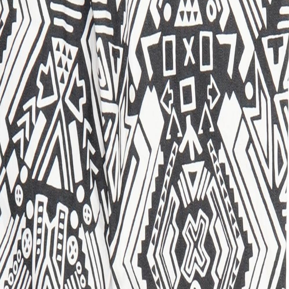 Brand and care label for Divided women’s multicoloured geometric denim tapered jeans, size UK 10, 28-inch leg