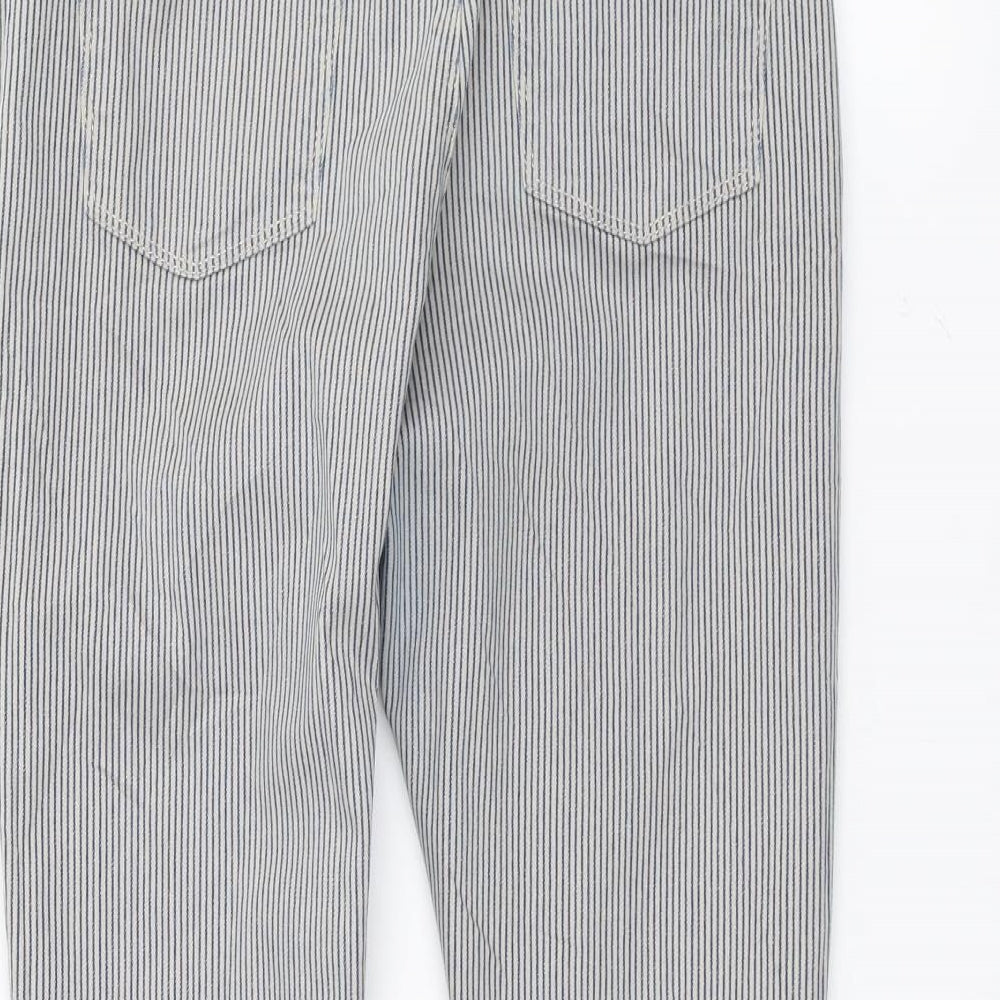 Brand and care label for Marks & Spencer women’s white striped skinny jeans, size UK 10, 25-inch leg