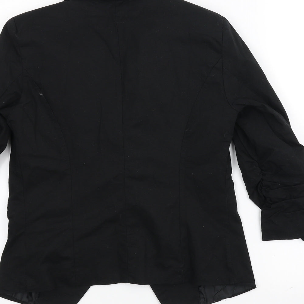 Brand and care label for WAIG7 women’s black jacket, size S