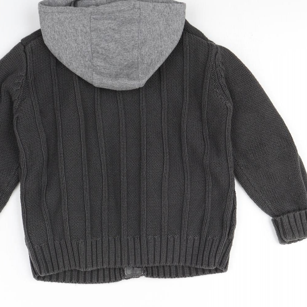 Brand and care label for Next boys’ grey jacket, size 3-4, years