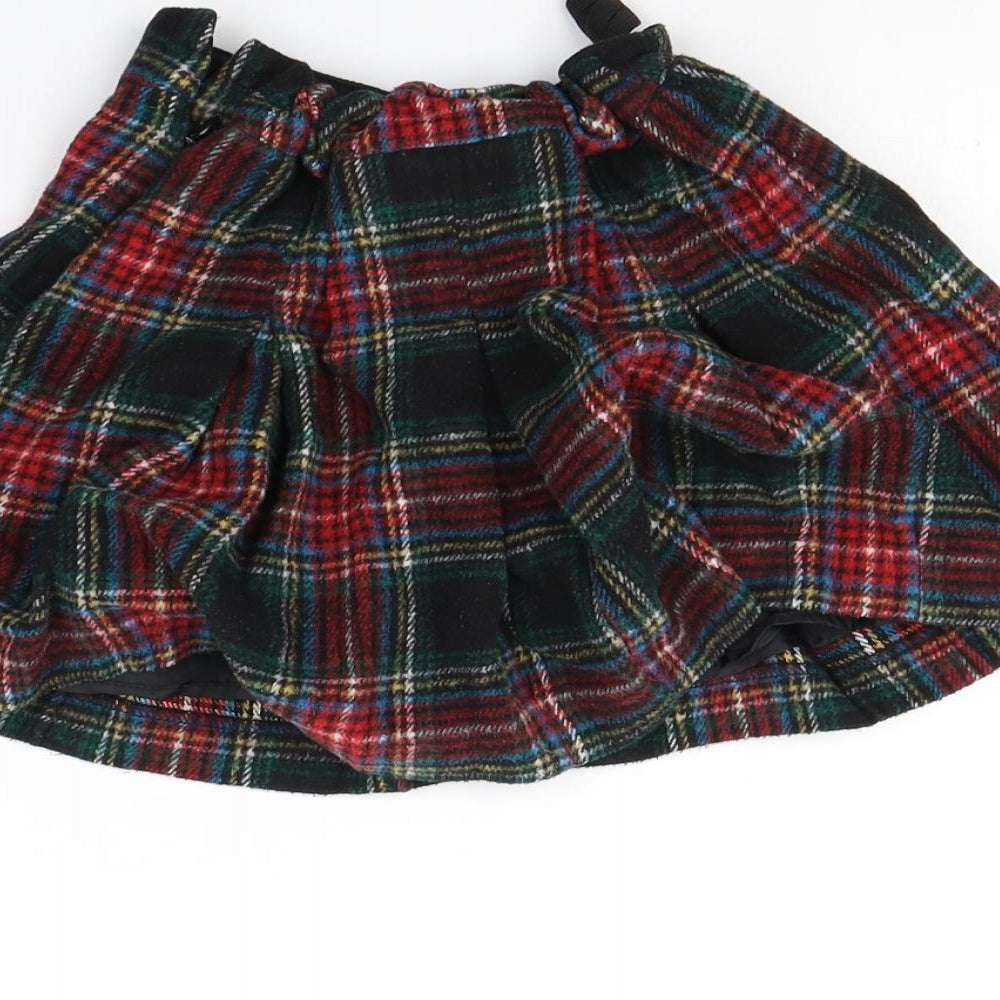Brand and care label for Next girls’ multicoloured check flare skirt, size 8, years