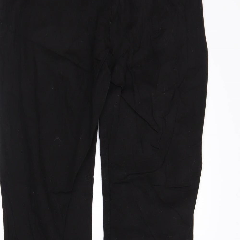 Brand and care label for H&M women’s black skinny jeans, size UK 12, 28-inch leg