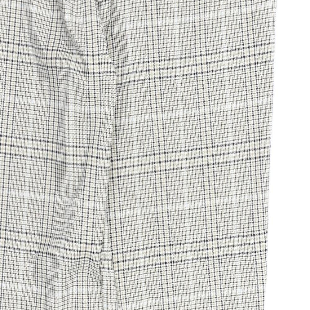 Brand and care label for Bershka men’s beige check dress pants trousers, size S, 26-inch leg