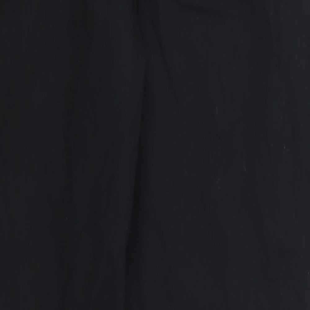 Brand and care label for Marks & Spencer women’s black trousers, size UK 10, 29-inch leg