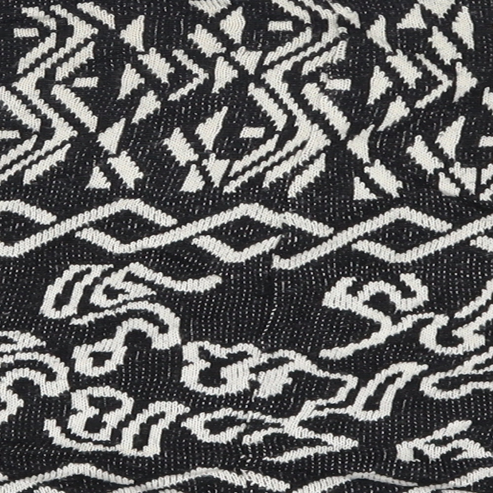 Brand and care label for Topshop women’s black geometric jumper, size UK 10