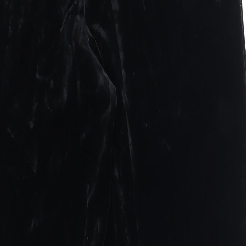 Brand and care label for Marks & Spencer women’s black trousers, size UK 16, 25-inch leg