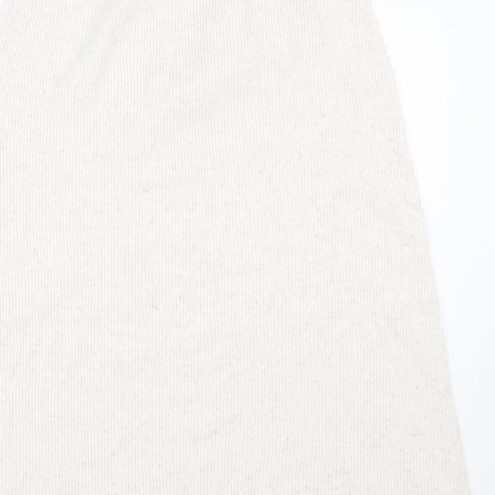 Brand and care label for Marks & Spencer women’s beige a-line skirt, size M