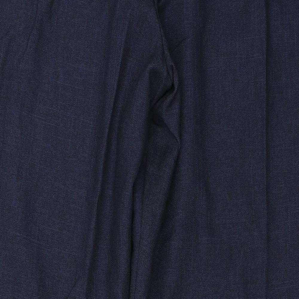 Brand and care label for Marks & Spencer women’s blue trousers, size UK 16, 26-inch leg