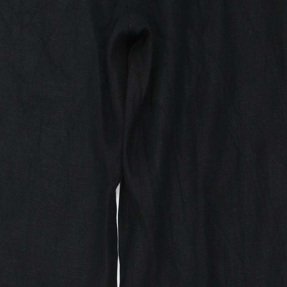 Brand and care label for Per Una women’s black trousers, size UK 14, 27-inch leg