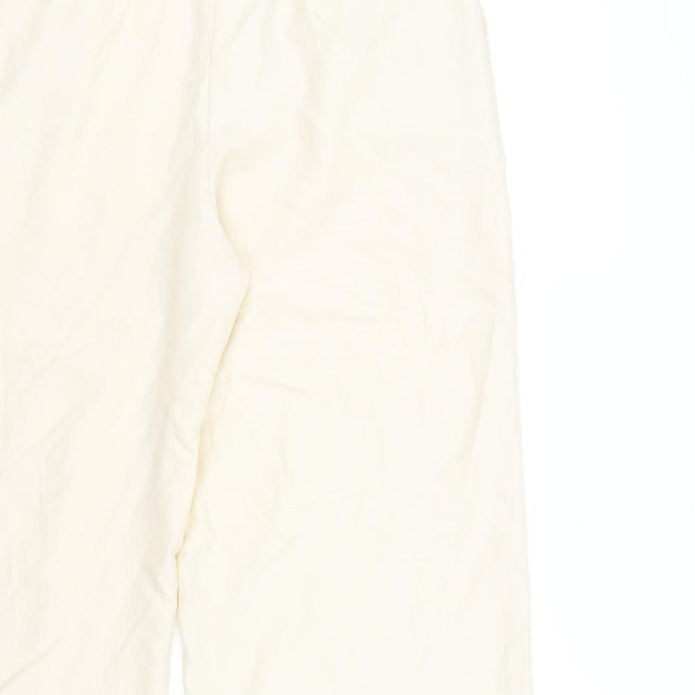 Brand and care label for Mango women’s beige trousers, size UK 8, 28-inch leg