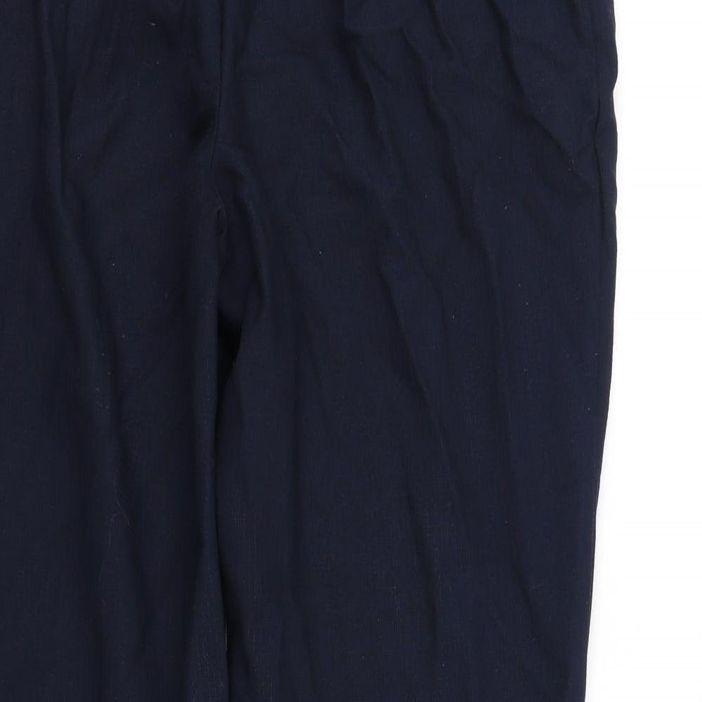 Brand and care label for Marks & Spencer women’s blue trousers, size UK 16, 27-inch leg