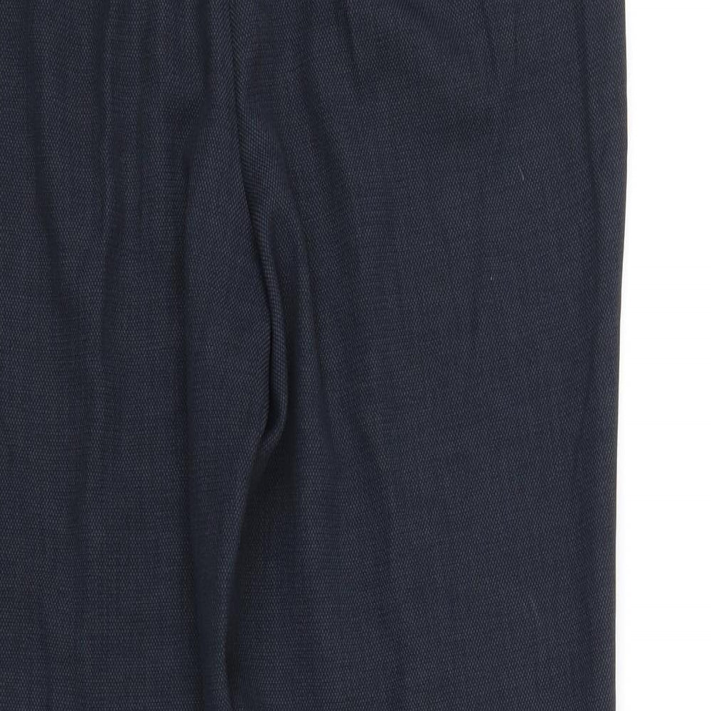 Brand and care label for Marks & Spencer women’s blue trousers, size UK 12, 31-inch leg