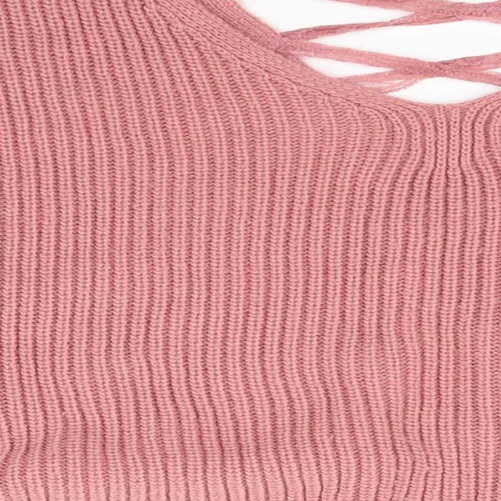 Brand and care label for Miss Selfridge women’s pink jumper, size UK 10