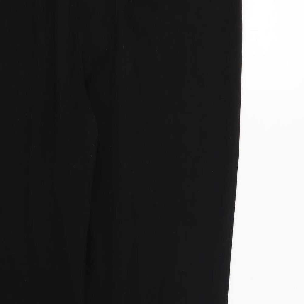 Brand and care label for Marks & Spencer women’s black trousers, size UK 18, 31-inch leg