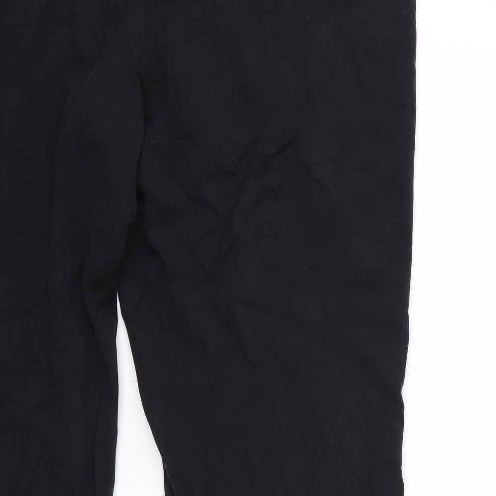 Brand and care label for Marks & Spencer women’s blue trousers, size UK 16, 26-inch leg