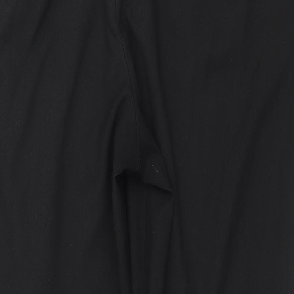 Brand and care label for Marks & Spencer women’s blue trousers, size UK 14, 27-inch leg