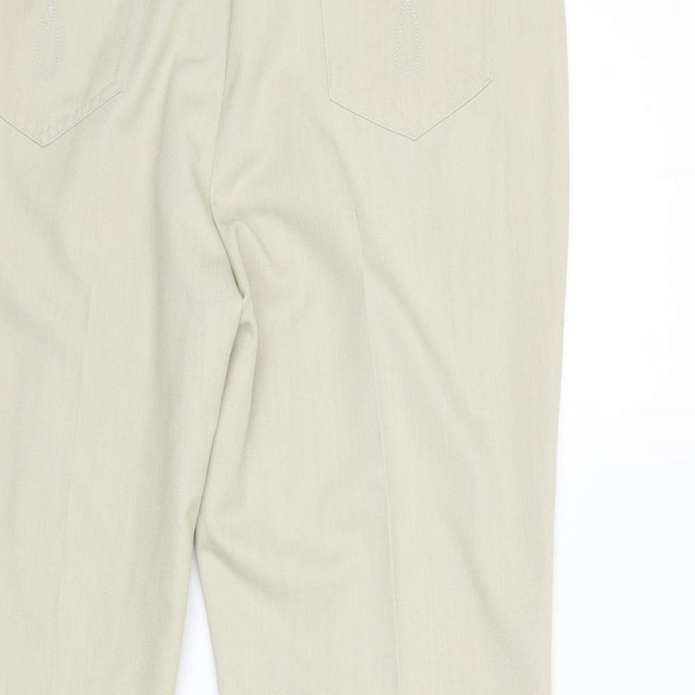 Brand and care label for Marks & Spencer women’s beige trousers, size UK 18, 29-inch leg
