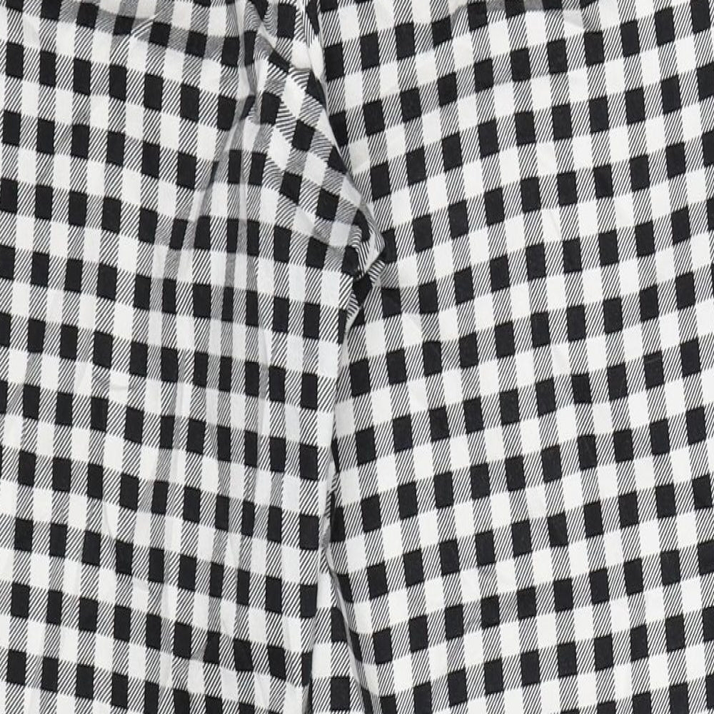Brand and care label for Denim Co women’s multicoloured check trousers, size UK 14, 26-inch leg