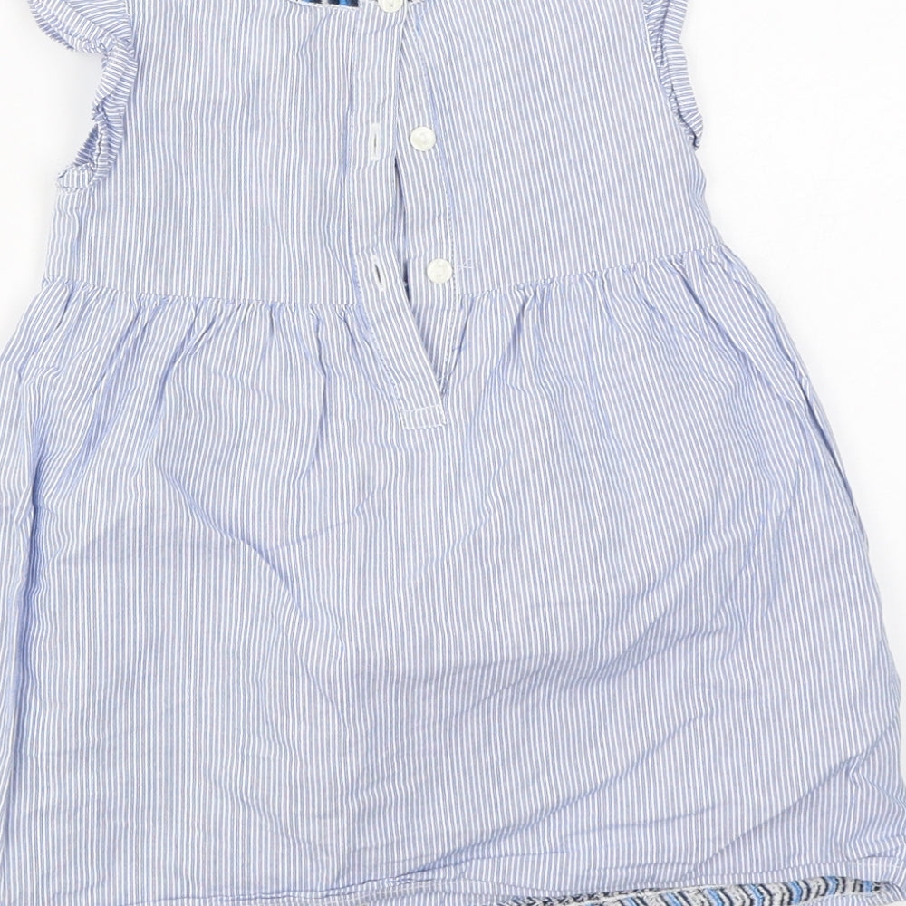 Brand and care label for Matalan boys’ blue striped a-line, size 12-18, months