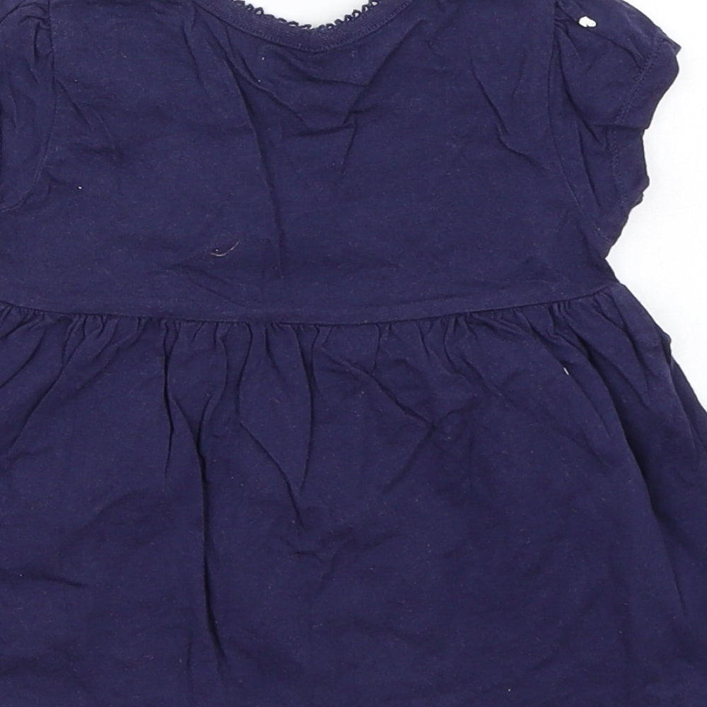 Brand and care label for Ladybird girls’ blue skater dress, size 18-24, months