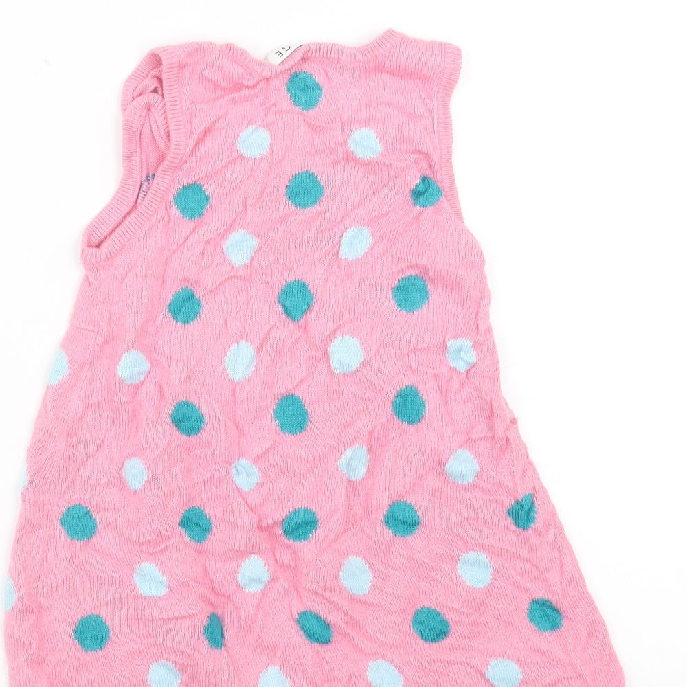 Brand and care label for George girls’ pink polka dot knit jumper dress, size 18-24, months