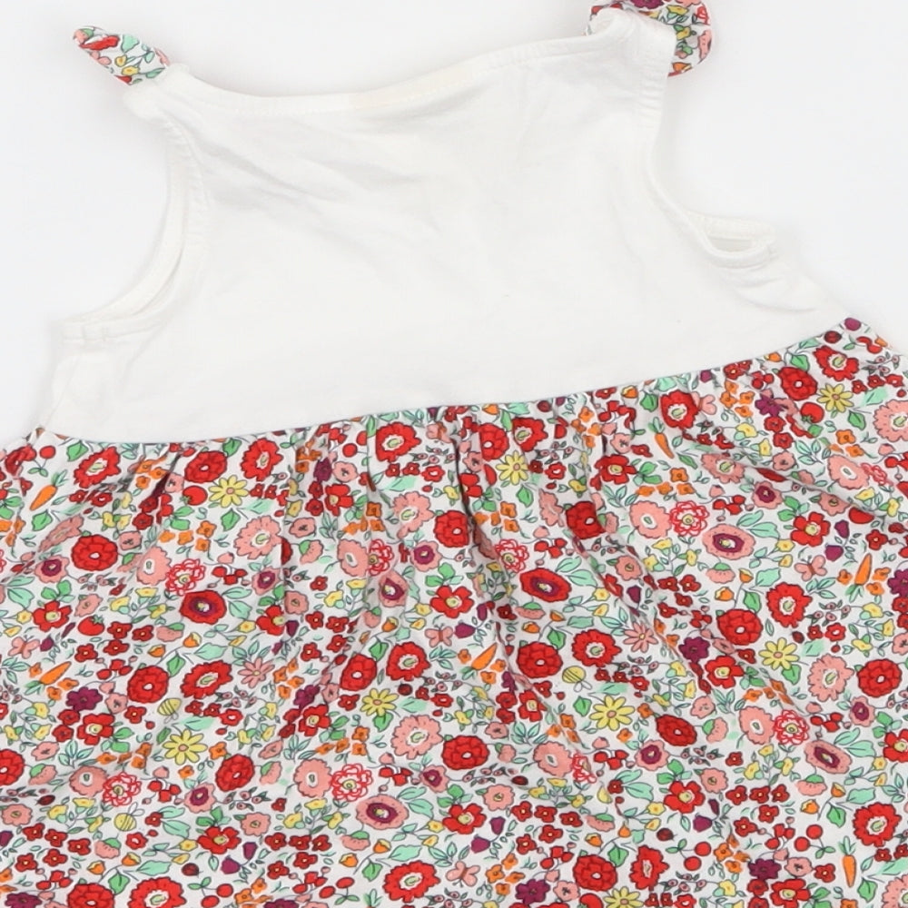 Brand and care label for First Impressions girls’ multicoloured floral jersey skater dress, size 3-6, months