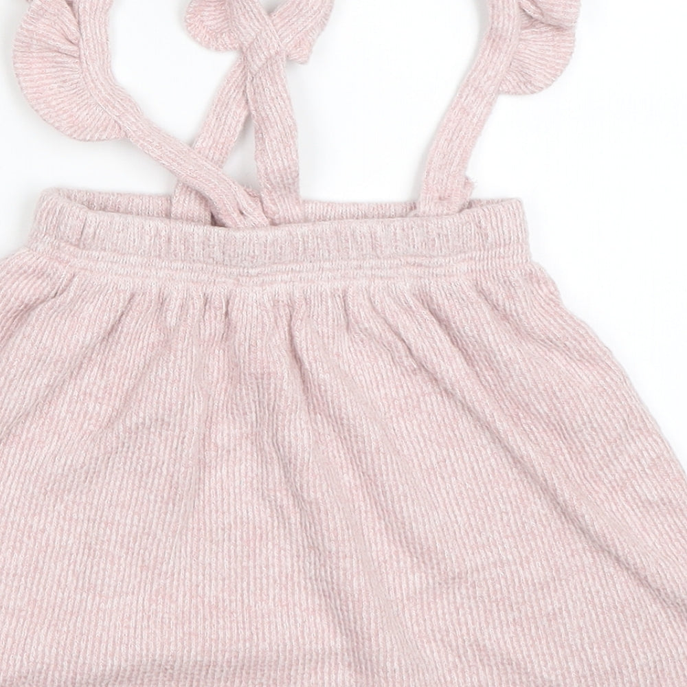 Brand and care label for George girls’ pink pinafore/dungaree dress, size 12-18, months
