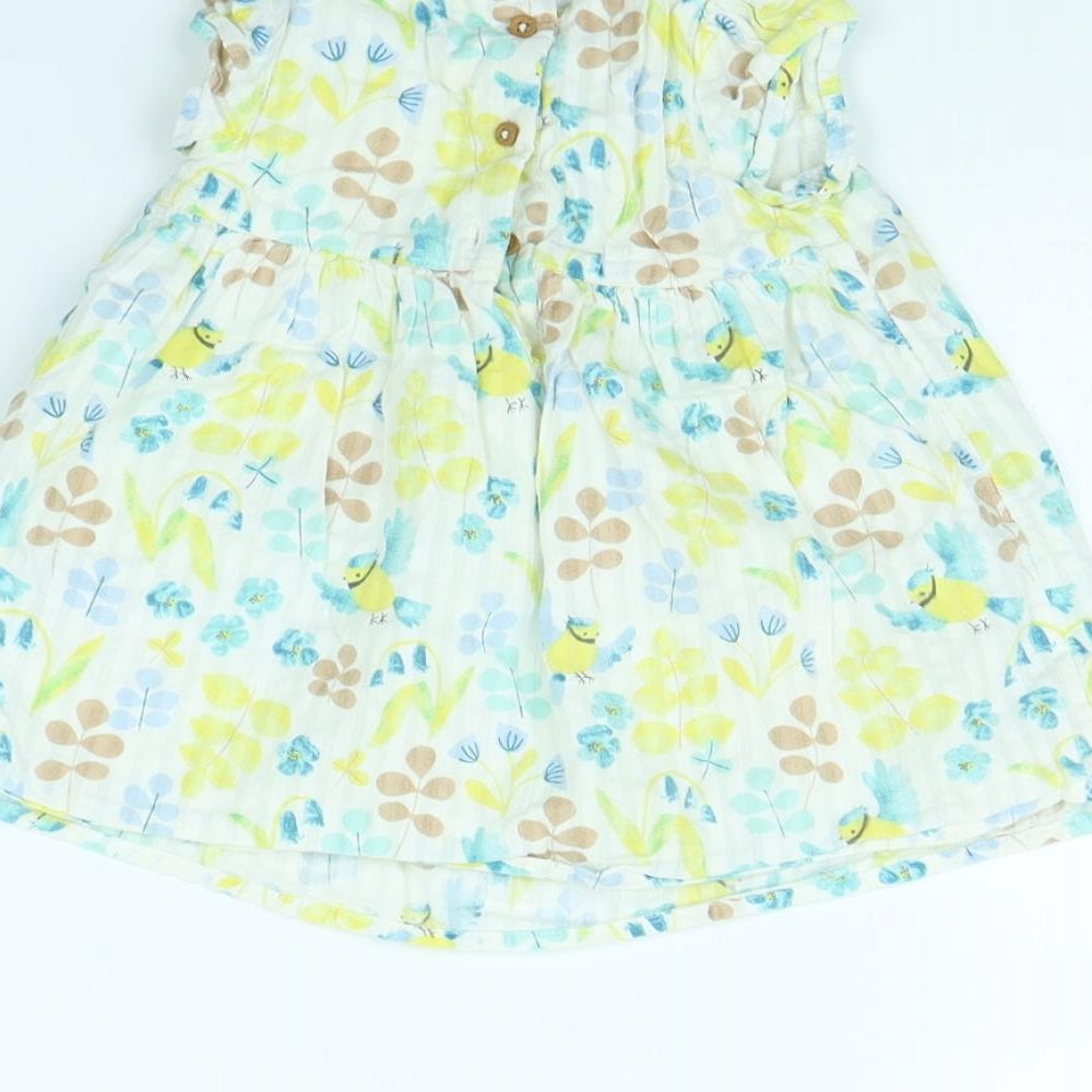 Brand and care label for Marks & Spencer girls’ yellow floral fit & flare, size 3-6, months