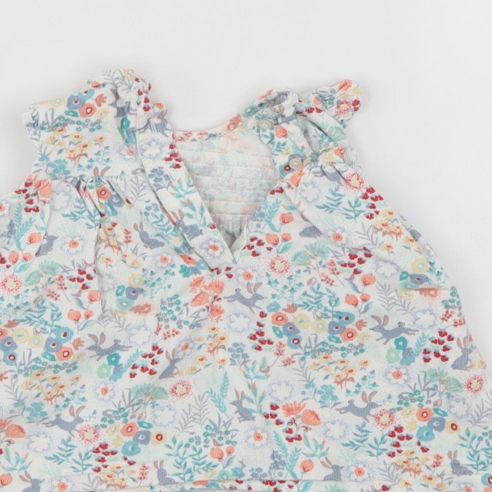 Brand and care label for Marks & Spencer girls’ multicoloured floral t-shirt dress, size 3-6, months