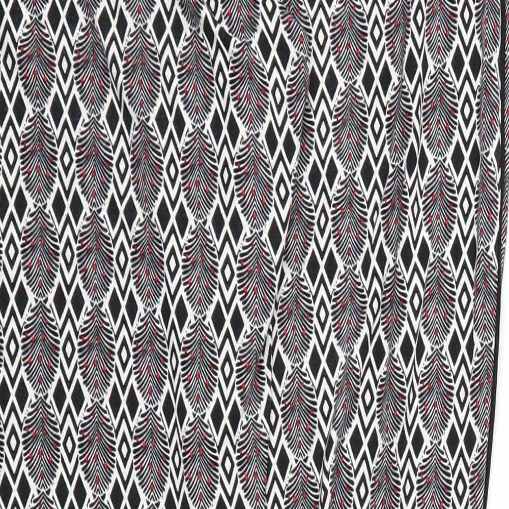 Brand and care label for Next women’s black argyle/diamond trousers, size UK 10, 29-inch leg - stretch waistband