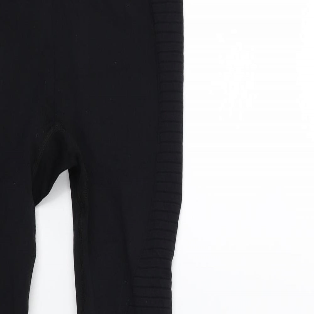 Brand and care label for Preworn women’s beige carrot leggings, 23-inch leg