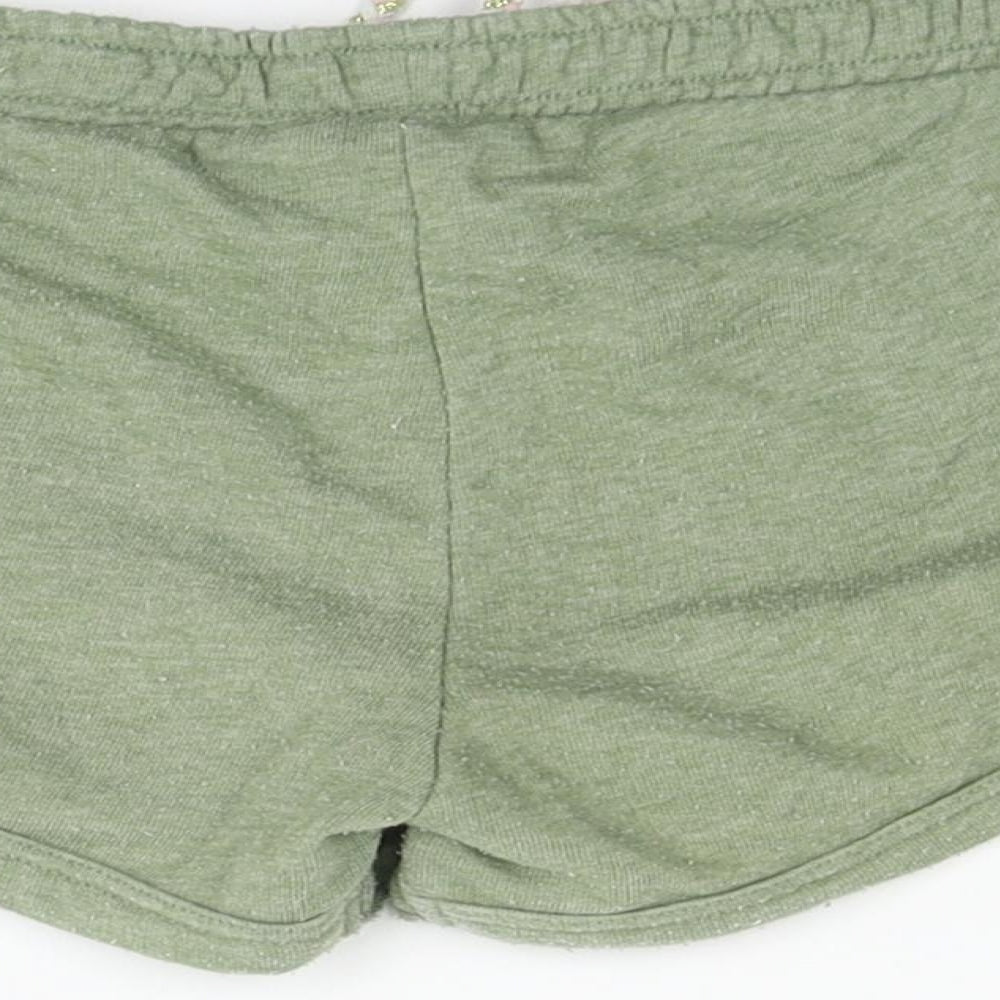 Brand and care label for I love girls’ wear girls gold sweat shorts, size 6, years