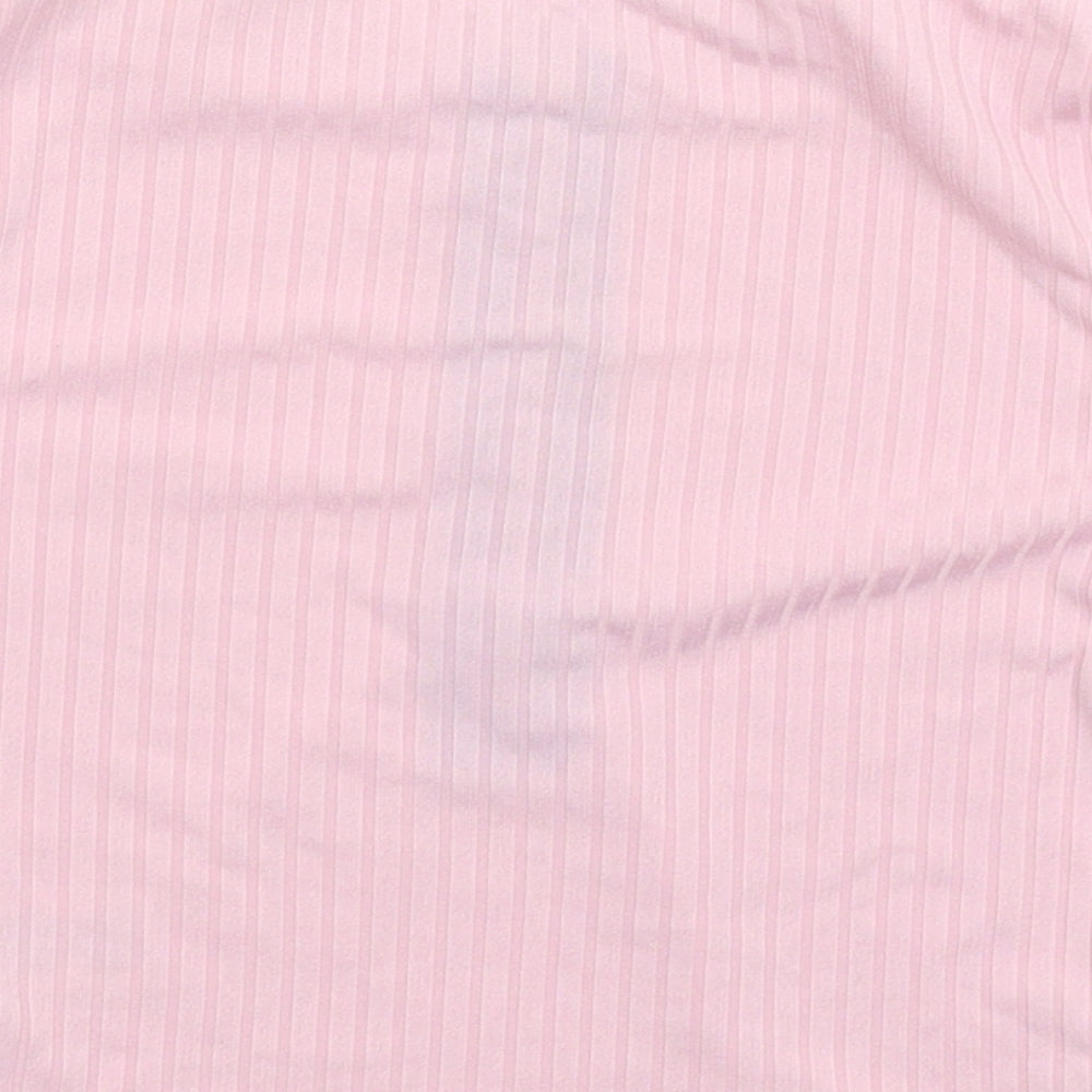 Brand and care label for PRETTYLITTLETHING women’s pink basic t-shirt, size UK 4